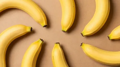 Bananas Arranged in Circle on Textured Background - Food - AI generated image