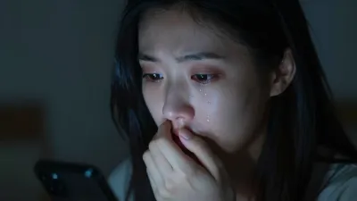 Anxious Woman Staring at Phone Screen - Portrait - AI generated image