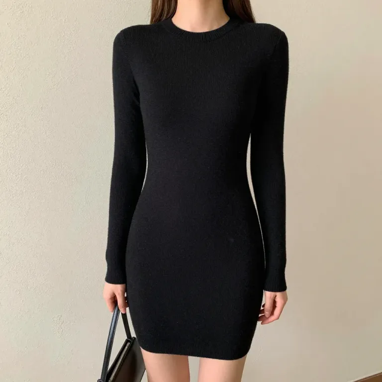 Woman in Black Knit Dress Holding Bag - Fashion - AI generated image