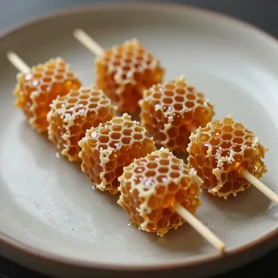 Honeycomb Candy Pieces on Skewers - Food - AI generated image