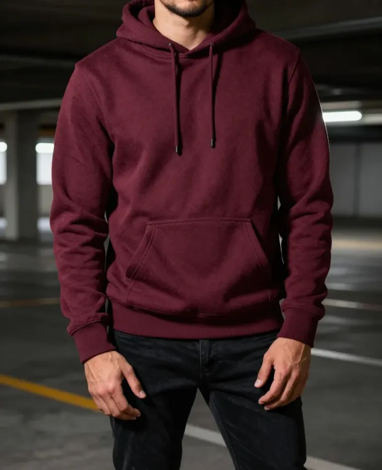Person in Burgundy Hoodie in Dimly Lit Garage - Fashion - AI generated image