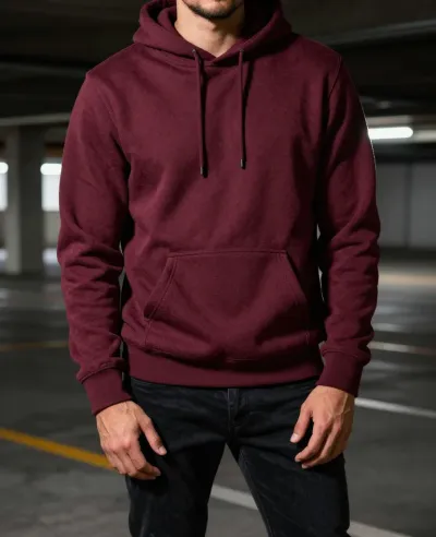 Person in Burgundy Hoodie in Dimly Lit Garage - Fashion - AI generated image