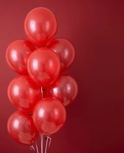 Glossy Red Balloons Clustered in Soft Light - Festive - AI generated image