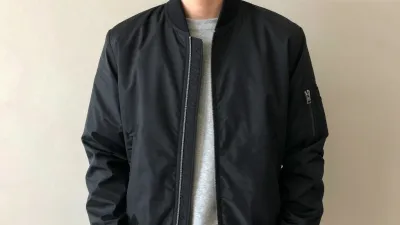 Person Wearing Black Bomber Jacket - Fashion - AI generated image
