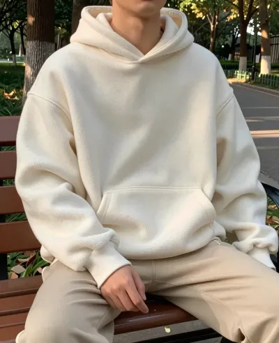 Cream Hoodie Model Relaxing on Park Bench - Fashion - AI generated image