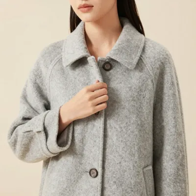 Gray Coat with Hand on Lapel - Fashion - AI generated image
