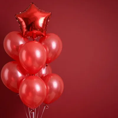Glossy Red Balloons Clustered with Star - Celebration - AI generated image