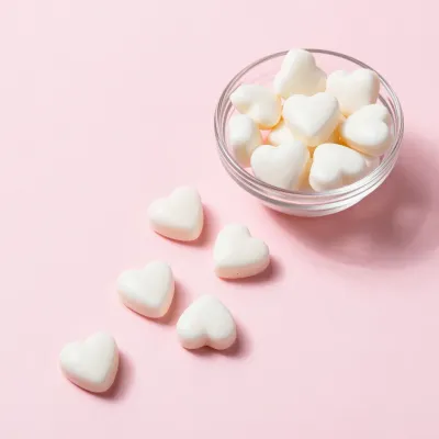 Heart-Shaped Mints Overflowing Bowl - Food - AI generated image