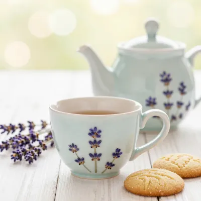 Lavender Teacup with Cookies and Lavender Blossoms - Food - AI generated image