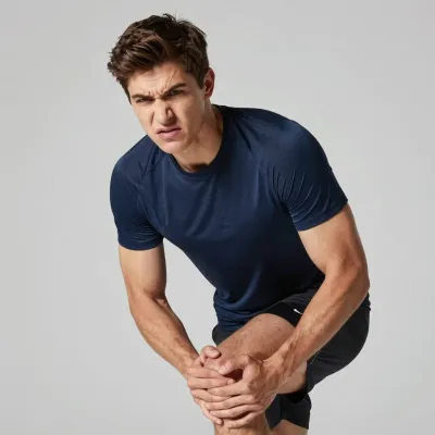 Athlete with Bent Knee Holding Leg - Athlete - AI generated image